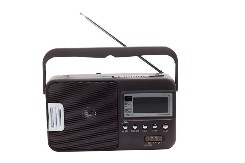 Image of a black portable radio with silver buttons and a handle