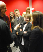 School pupils talking to John Rockley