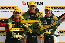 Champions (Matt Neal (centre) the BTCC Champion of 2006 on the podium with Gordon Shedden (right) and Fabrizio Giovanardi (Ieft), at Silverstone)