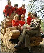 Carol Hughes with local schoolchildren