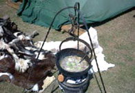 Photo showing some Viking stew cooking in a pot above a open fire