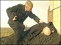 Reconstruction showing the discovery of a miner's body in a Yorkshire coal yard