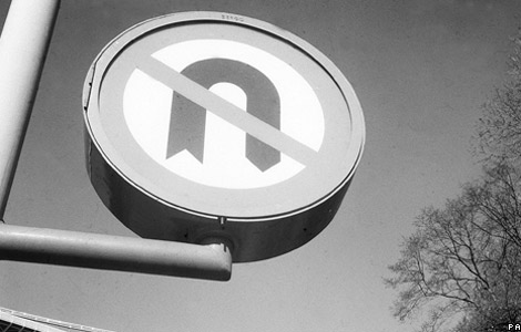 A u-turn sign