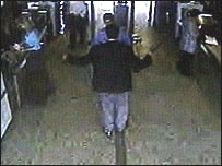 Saldırganlardan biri kontrolden geçiyor