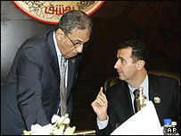 عمرو موسی، دبیرکل اتحادیه عرب و بشار اسد، رئیس جمهور سوریه و میزبان اجلاس