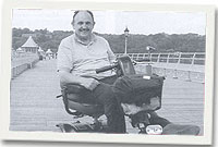 Gwyndaf Jones - ar y pier mewn chwinciad wedi cael ail-ddechrau defnyddio ei gerbyd batri