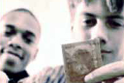 Image: teenage boys learning about condoms