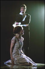 Woman weeping on the floor before a man