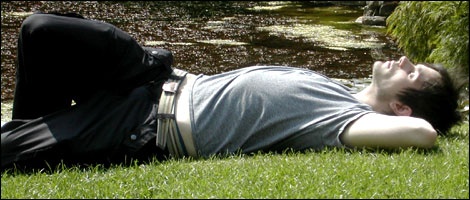 Ryan relaxing on the grass at YSP