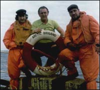 Three men onboard ship 200