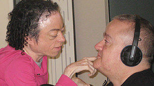 Liza Carr feels Geoff Adams-Spink's face