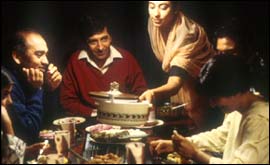 A Muslim family enjoying a late meal 
