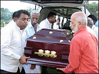 Dharmasiri Lankapeli (r) attending the funeral in Velvetithurai (photo: Tamilnet)