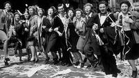 People dance in the streets of London on VE Day, 8 May 1945 