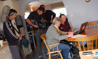 Simon gets his instructions from a DVD