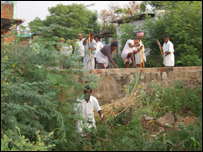 Wall being demolished