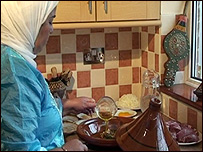 Preparing a traditional Moroccan lamb prune tagine