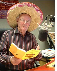 Roy Waller with his Spanish learning manual