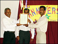 Mr Razeek (L) at a charity function in 2005