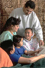 Parents and children share family home evening