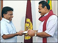 Dulles Alahapperuma (L) being appointed as the transport minister