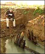 David Bradley in a trench