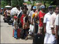Jaffna refugees waiting in a queue to board a ship