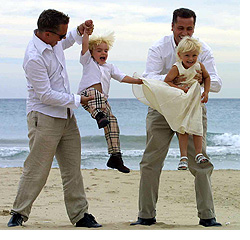 Image: Barrie and Tony Drewitt-Barlow with their twins, Saffron and Aspen