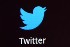 Apps on a smartphone including Twitter, Facebook and Skype