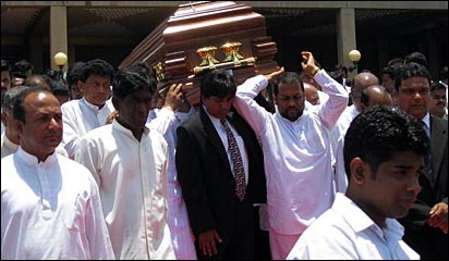 Minister's body taken to parliament (photo Elmo Fernando)