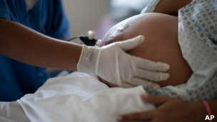 Mulher grávida (Foto AP)