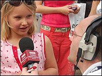 Jonathan Myles talks to a young girl