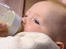 Baby being bottle fed