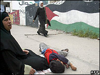 بھیک مانگنے والی ایک فلسطینی خاتون 