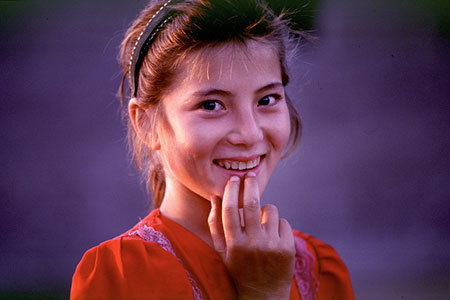 Girl smiling, photo by Tom Ang