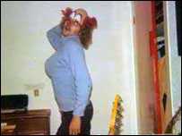 Man dressed as a clown woman 203