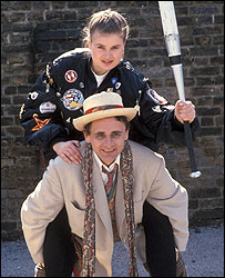 Ace gets a piggyback from the Doctor