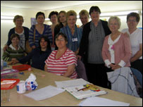 Chris in the centre with Barbara to her left and some of the Happy Monday group members.