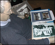 Richard looks at pictures of his Grandad's team