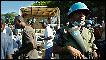 United Nations soldiers secure the scene in Haiti as food is distributed