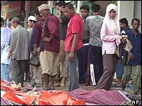 Тіла загиблих на вулицях Аче