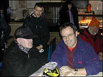 Mike Parr with homeless person