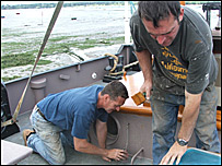 Jonathon and Richard painting Melissa