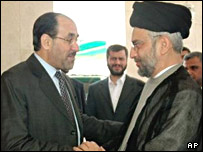 مالکی (چپ) و عبدالعزيز حکيم رهبر مجلس اعلای انقلاب اسلامی عراق