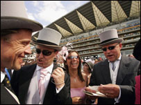 Race-goers celebrate a win at Royal Ascot