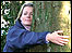 BBC presenter Victoria Graham hugging a tree