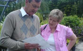 John suggests to Valerie where her new plants should go...