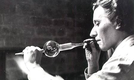 Blowing of glass to shape