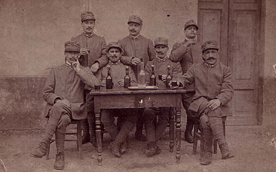 Soldiers sitting around a table