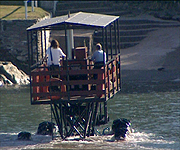 Neil catches a lift in the sea tractor to get across to Burgh  Island